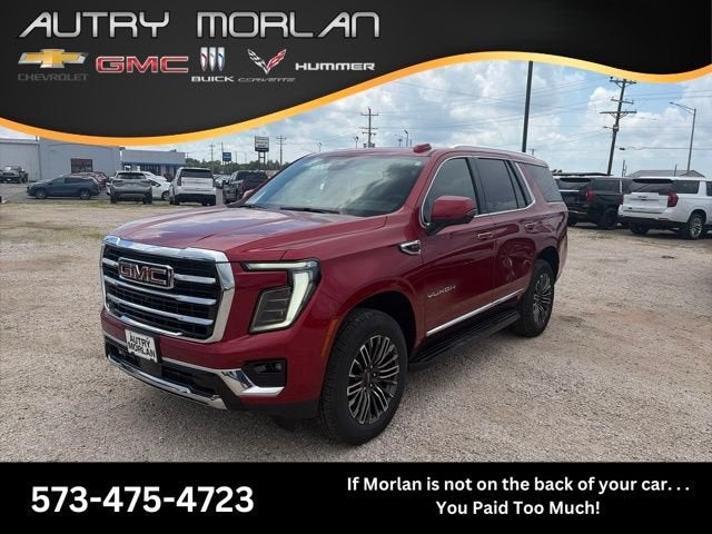 2026 GMC Yukon Elevation in Volcanic Red Tintcoat — front three-quarter view
