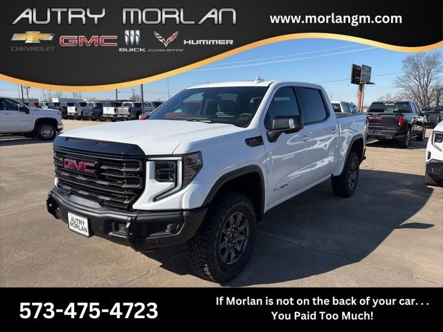 2026 GMC Sierra 1500 AT4X in Summit White — front three-quarter view