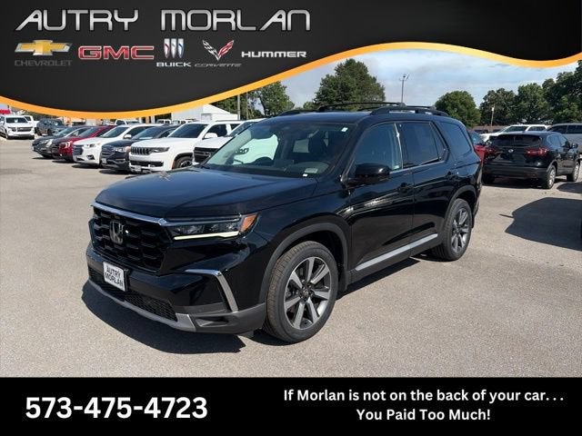 2023 Honda Pilot Elite in Black — front three-quarter view